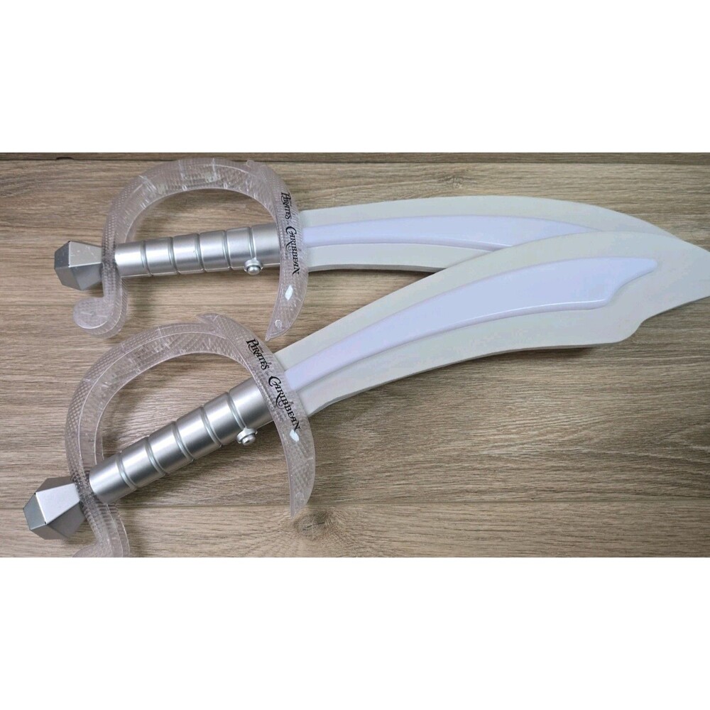 Lot of 2 Genuine Disney Foam & Plastic Light Up Pirated of the Caribbean Sword